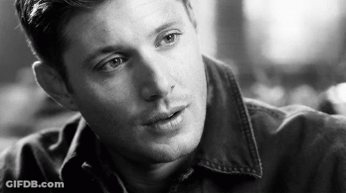 Close Up Of Man's Face In Black And White Photo GIF