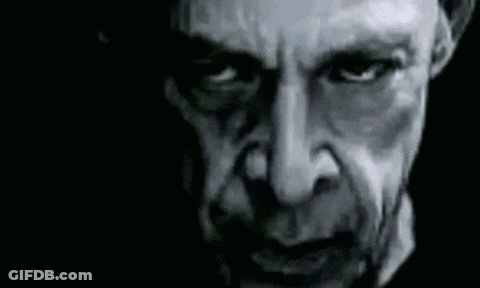 Close Up Of Man's Face In Black And White GIF