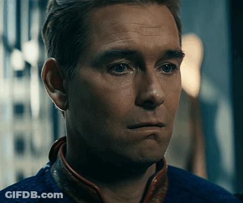 Close Up Of Man's Face In Blue Jacket GIF