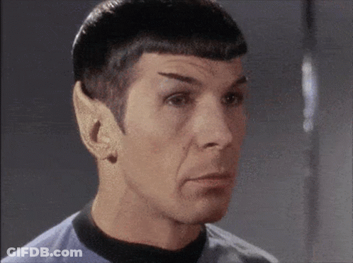Close Up Of Man's Face In Blue Shirt GIF