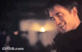 Close Up Of Man's Face In Blurry Photo GIF