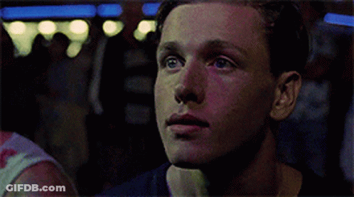 Close Up Of Man's Face In Dark Room GIF