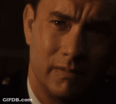Close Up Of Man's Face In Dark Room GIF