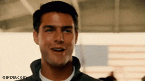 Close Up Of Man's Face In Gray Jacket GIF