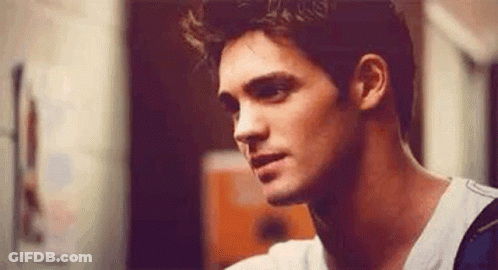 Close Up Of Man's Face In Room GIF