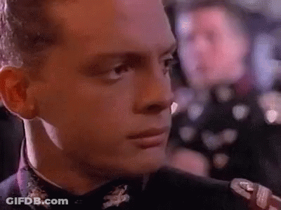 Close Up Of Man's Face In Suit GIF