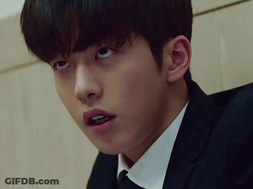 Close Up Of Man's Face In Suit And Tie GIF