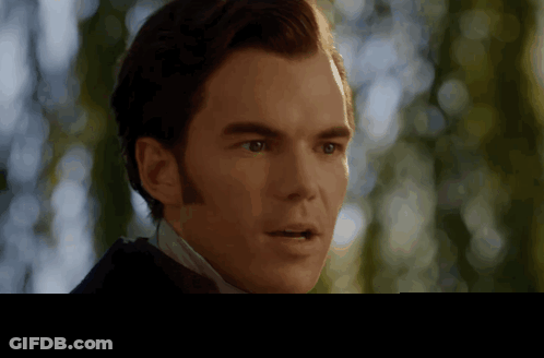 Close Up Of Man's Face In Suit And Tie GIF