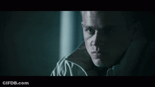 Close Up Of Man's Face In The Dark GIF
