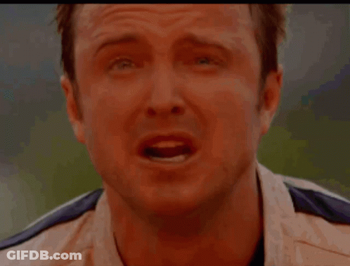 Close Up Of Man's Face In White Shirt And Black Tie GIF