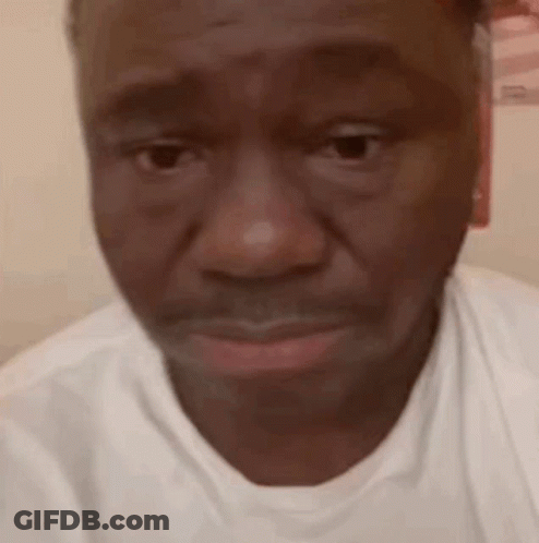Close Up Of Man's Face In White Shirt GIF