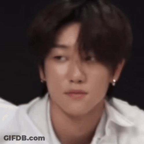 Close Up Of Man's Face In White Shirt GIF