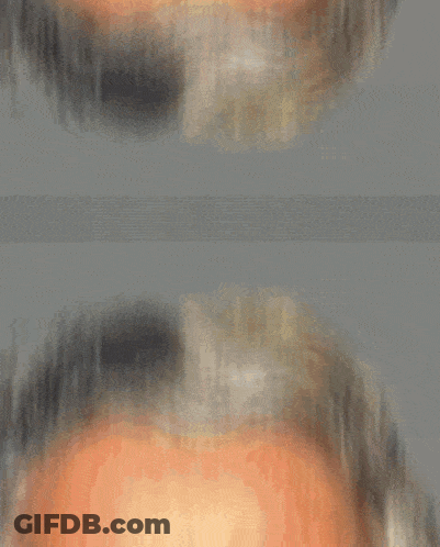 Close Up Of Man's Face In White Shirt GIF