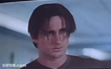 Close Up Of Man's Face On TV GIF