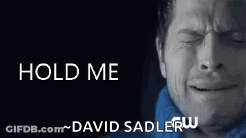 Close Up Of Man's Face Saying Hold Me GIF