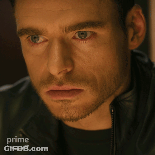 Close Up Of Man's Face With Amazon Prime Logo GIF