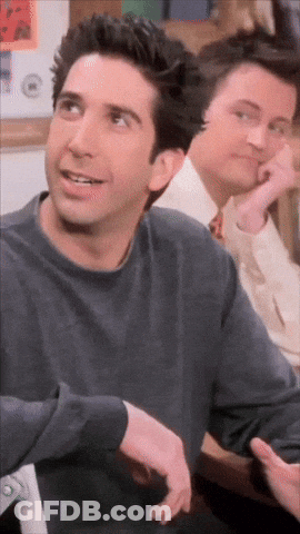 Close Up Of Man's Face With Another Man In Background GIF