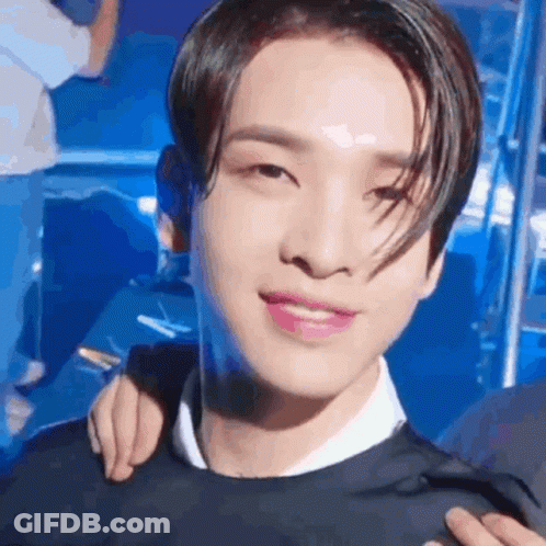 Close Up Of Man's Face With Arm Around Neck GIF