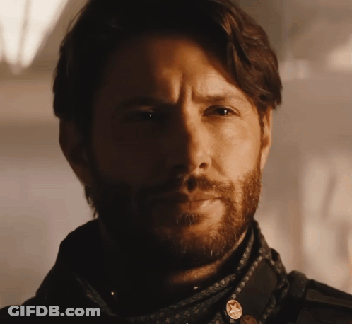 Close Up Of Man's Face With Badge GIF