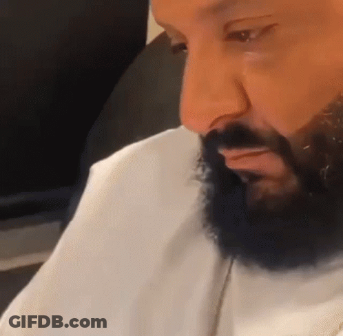 Close Up Of Man's Face With Beard And White Shirt GIF