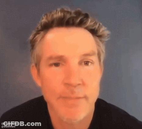Close Up Of Man's Face With Blue Background GIF