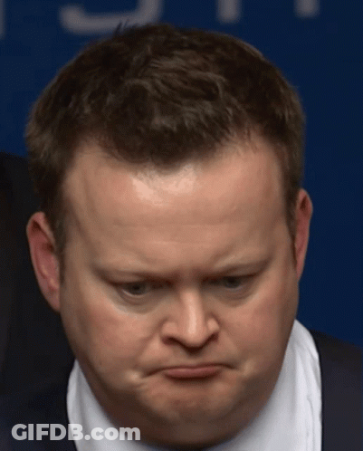 Close Up Of Man's Face With Blue Background GIF