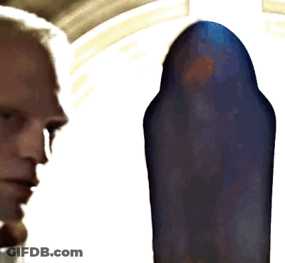 Close Up Of Man's Face With Blue Background GIF