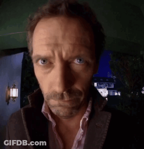 Close Up Of Man's Face With Blue Eyes GIF