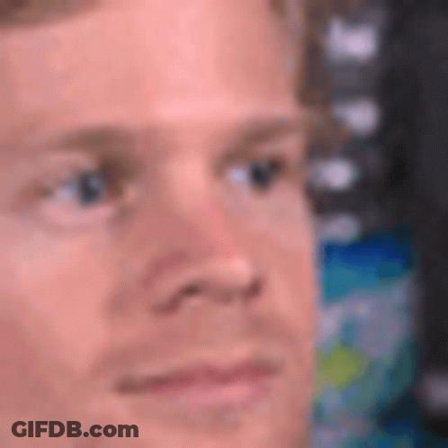 Close Up Of Man's Face With Blurry Background GIF