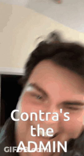 Close Up Of Man's Face With Contra Text GIF