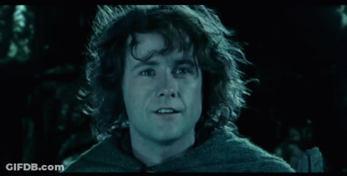 Close Up Of Man's Face With Dark Background GIF