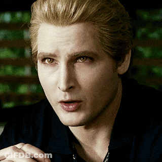 Close Up Of Man's Face With Dark Background GIF