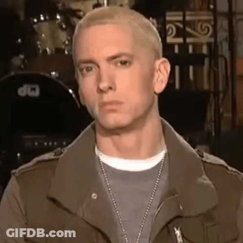 Close Up Of Man's Face With Drum GIF