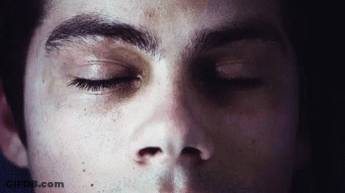 Close Up Of Man's Face With Eyes Closed GIF