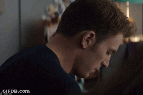Close Up Of Man's Face With Filmc Box Watermark GIF