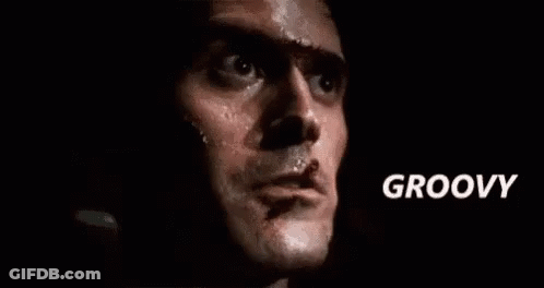 Close Up Of Man's Face With Groovy Text GIF