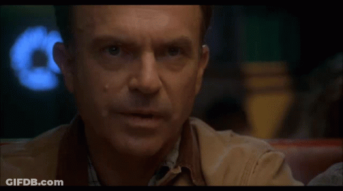 Close-Up Of Man's Face With Letter E GIF