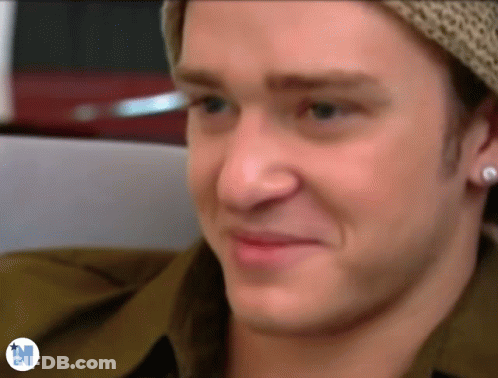 Close Up Of Man's Face With Letter N GIF