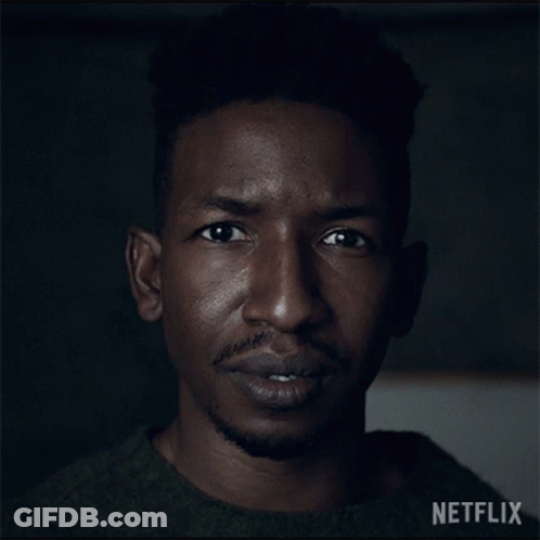 Close Up Of Man's Face With Netflix Logo GIF