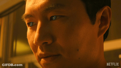 Close Up Of Man's Face With Netflix Logo GIF