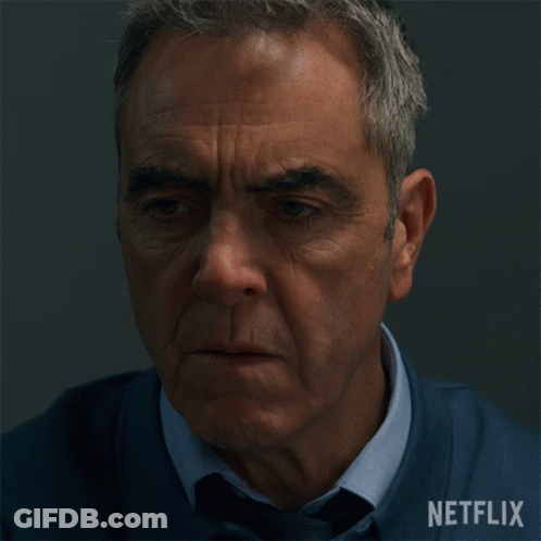 Close Up Of Man's Face With Netflix Logo GIF