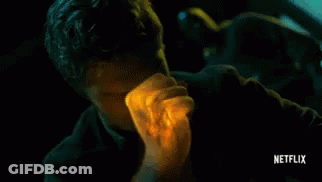 Close Up Of Man's Face With Netflix Logo GIF