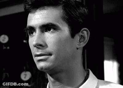 Close Up Of Man's Face With Number 7 GIF