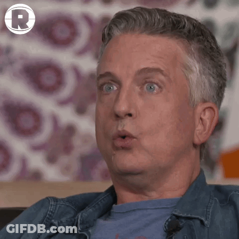 Close Up Of Man's Face With R Logo GIF