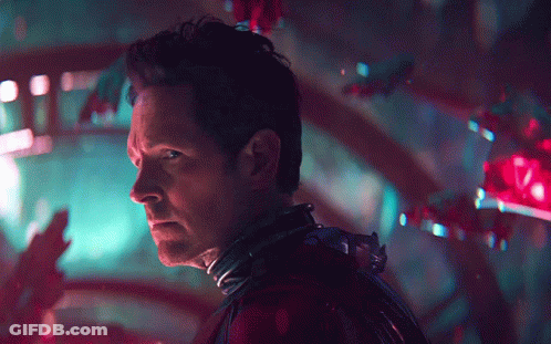 Close Up Of Man's Face With Red And Blue Background GIF