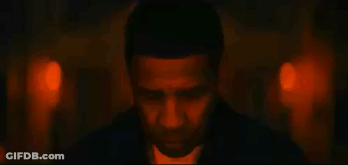 Close Up Of Man's Face With Red And Blue Lights GIF