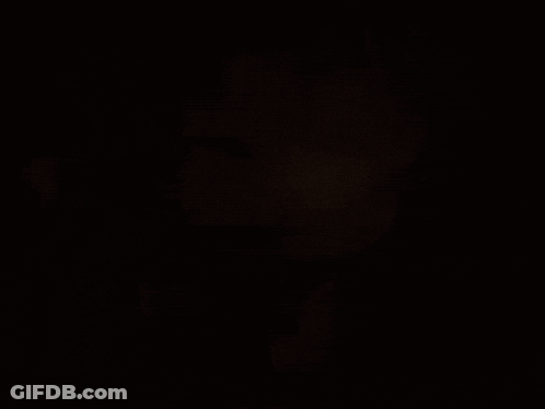 Close Up Of Man's Face With Red Light GIF