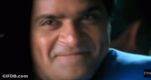 Close Up Of Man's Face With Telugu Logo GIF