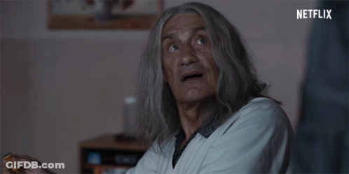 Close Up Of Man's Face With The Hills GIF