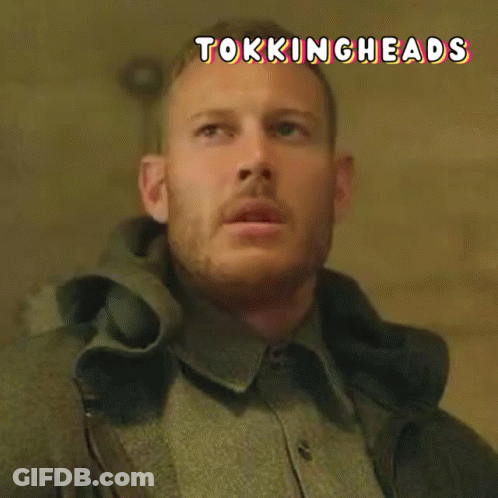 Close Up Of Man's Face With Tokingheads GIF